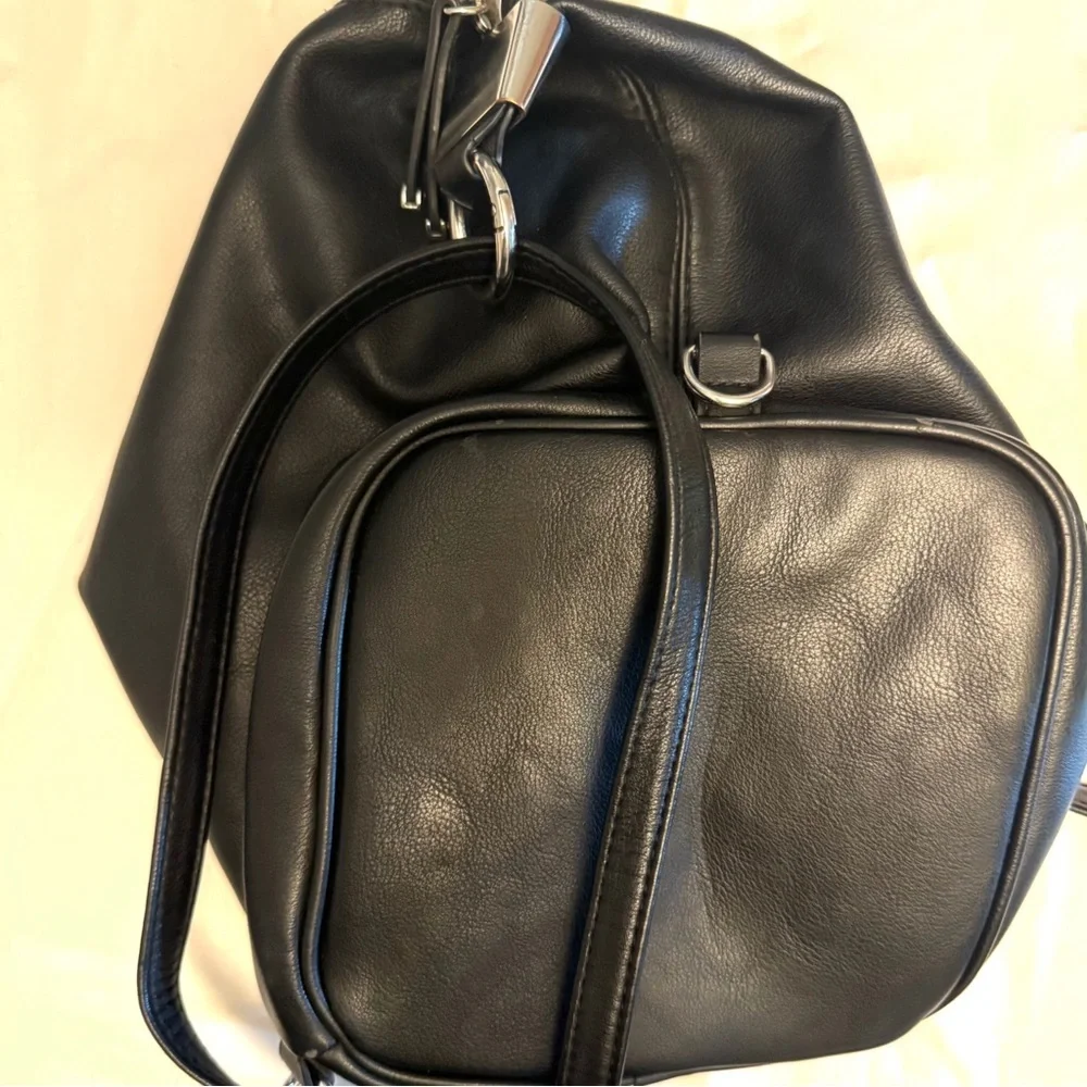Black Alfani Bangle Detail Sling Backpack